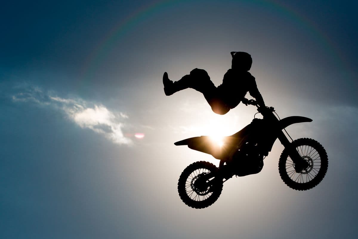 Motorcycle stuntman Mark Merrix performs at W. K. Kellogg Airport in Battle Creek, Mich. on Thursday, June 30, 2016. The Battle Creek Air Show and Balloon Festival began Wednesday and runs through Monday, July 4, 2016. (Bryan Bennett / Mlive.com)