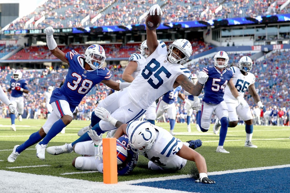 ORCHARD PARK, NEW YORK - AUGUST 13: Andrew Ogletree #85 of the Indianapolis Colts leaps for a touchdown during the fourth quarter of a preseason game against the Buffalo Bills at Highmark Stadium on August 13, 2022 in Orchard Park, New York. The touchdown was called back due to a penalty. (Photo by Bryan M. Bennett/Getty Images)