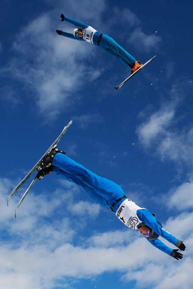 USA's Justin Schoenefeld, top, and Megan Smallhouse participate in training at the NorAm Freestyle Aerial Competition at Lake Placid Olympic Ski Jumping Complex in Lake Placid, N.Y. on Feb. 19, 2017. Schoenefeld placed 13th in the men's division with a score of 53.23	and Smallhouse placed second in the women's division with a score of 52.20.