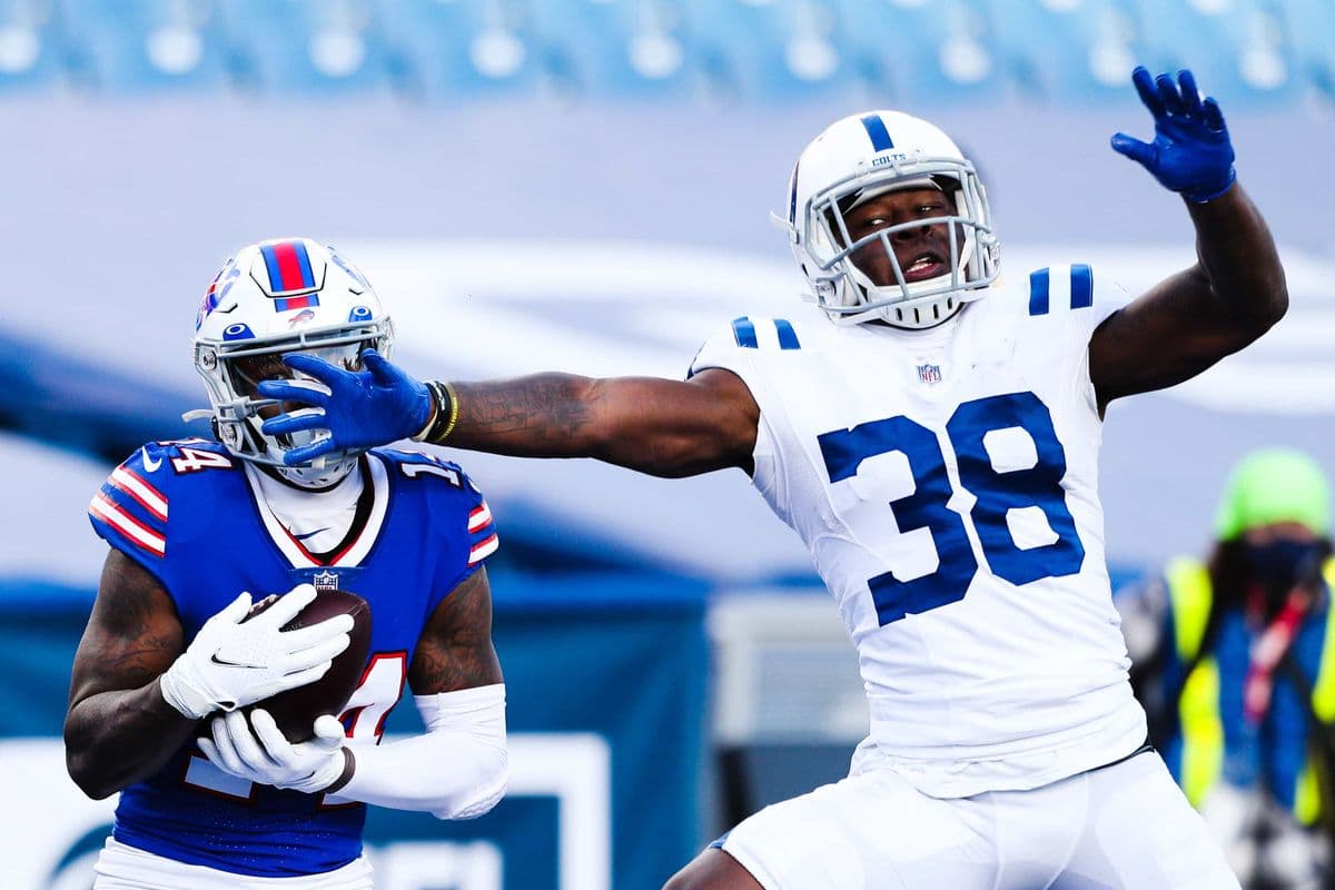 ORCHARD PARK, NEW YORK - JANUARY 09: Stefon Diggs #14 of the Buffalo Bills catches a touchdown pass as T.J. Carrie #38 of the Indianapolis Colts defends during the second half of the AFC Wild Card playoff game at Bills Stadium on January 09, 2021 in Orchard Park, New York. (Photo by Bryan M. Bennett/Getty Images)