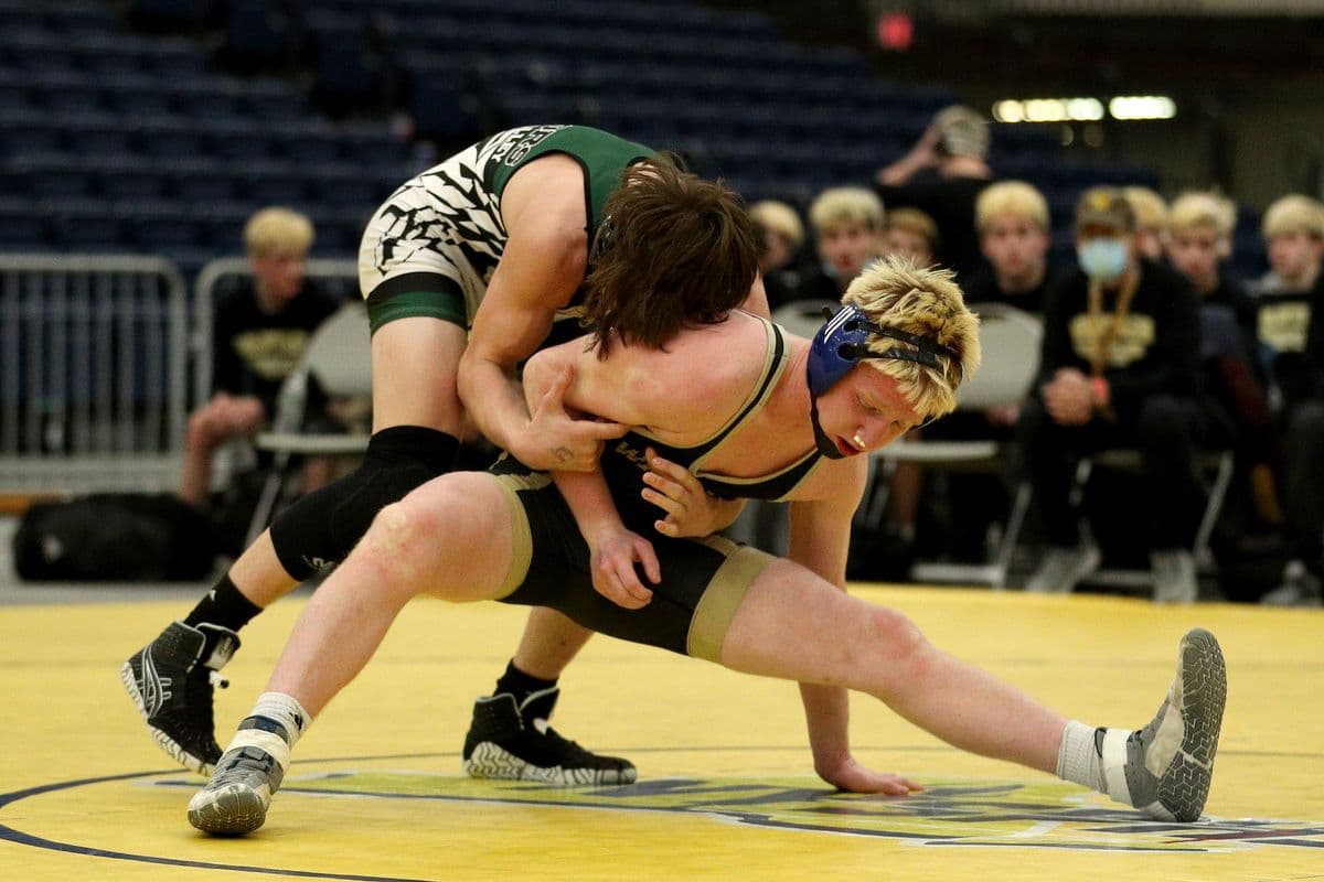 Minisink Valley's Luke Greiner, top, attempts to keep Wantagh's Jesse Vanorden down during their 145 pound bout at the 2022 NYSPHSAA Wrestling Dual Meet Championships at SRC Arena in Syracuse, N.Y. on Jan. 29, 2022.