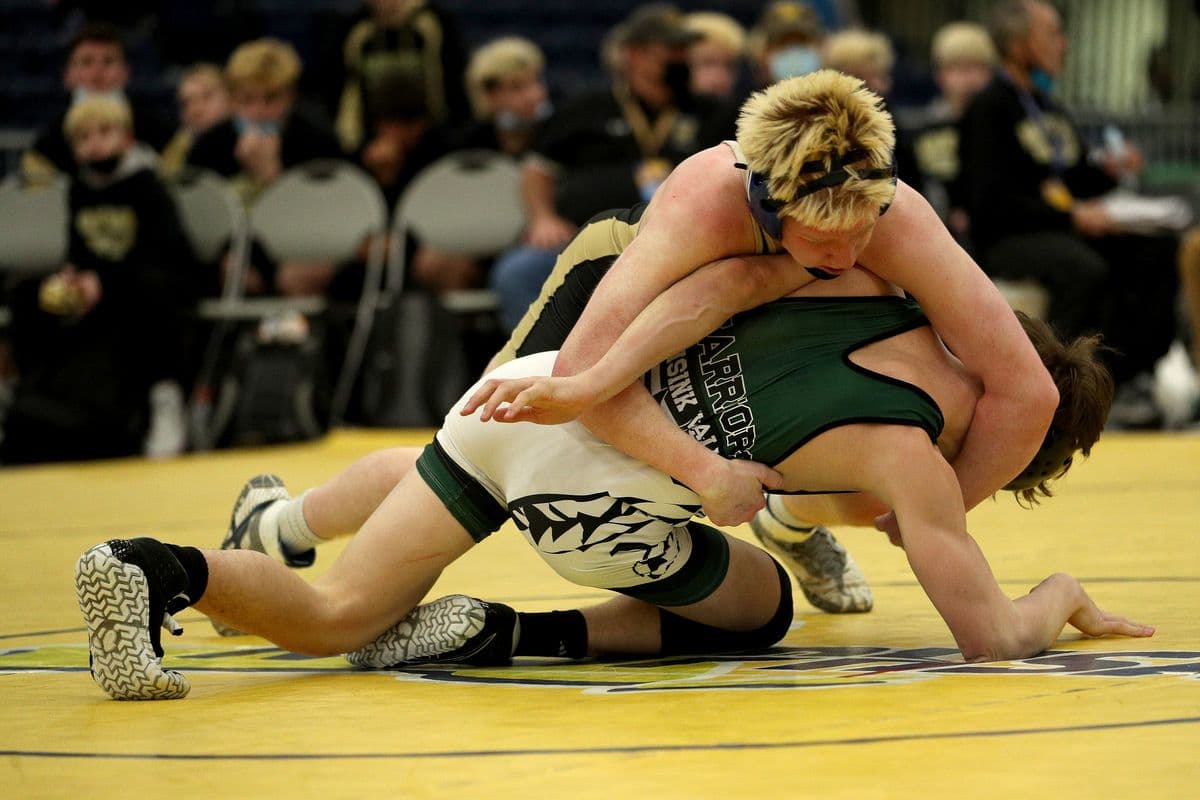 Wantagh's Jesse Vanorden, top, looks to turn Minisink Valley's Luke Greiner during their 145 pound bout at the 2022 NYSPHSAA Wrestling Dual Meet Championships at SRC Arena in Syracuse, N.Y. on Jan. 29, 2022.
