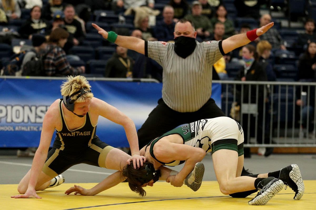 Wantagh's Jesse Vanorden, left, looks to escape Minisink Valley's Luke Greiner during their 145 pound bout at the 2022 NYSPHSAA Wrestling Dual Meet Championships at SRC Arena in Syracuse, N.Y. on Jan. 29, 2022.
