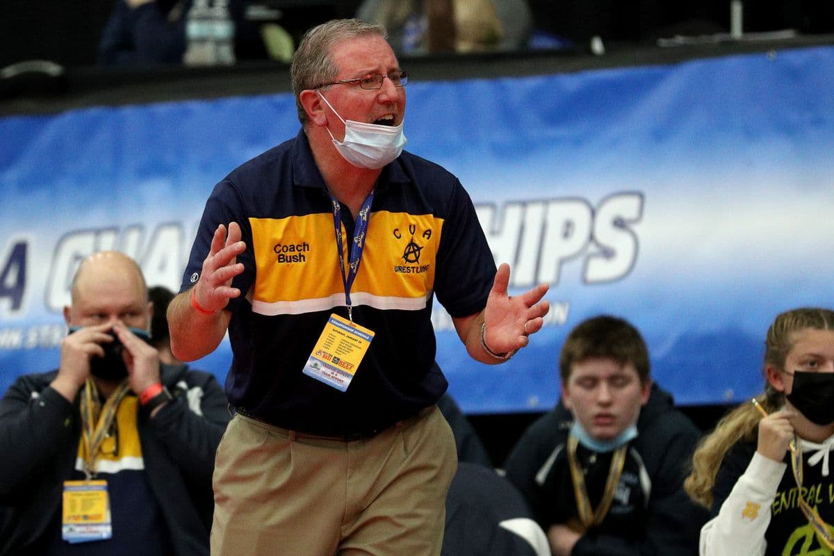 Central Valley Academy Head Coach Bob Bush reacts during a match against Shoreham-Wading River during the 2022 NYSPHSAA Wrestling Dual Meet Championships at SRC Arena in Syracuse, N.Y. on Jan. 29, 2022.