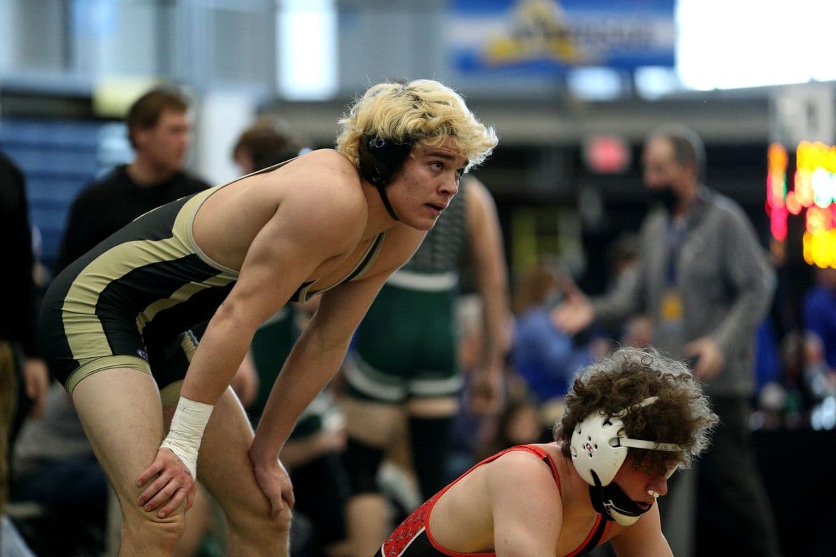 Wantaghs Noah Corwin, left, waits to get in referees position during a 172 pound bout against Lancasters Michael Schaefer at the 2022 NYSPHSAA Wrestling Dual Meet Championships at SRC Arena in Syracuse, N.Y. on Jan. 29, 2022.