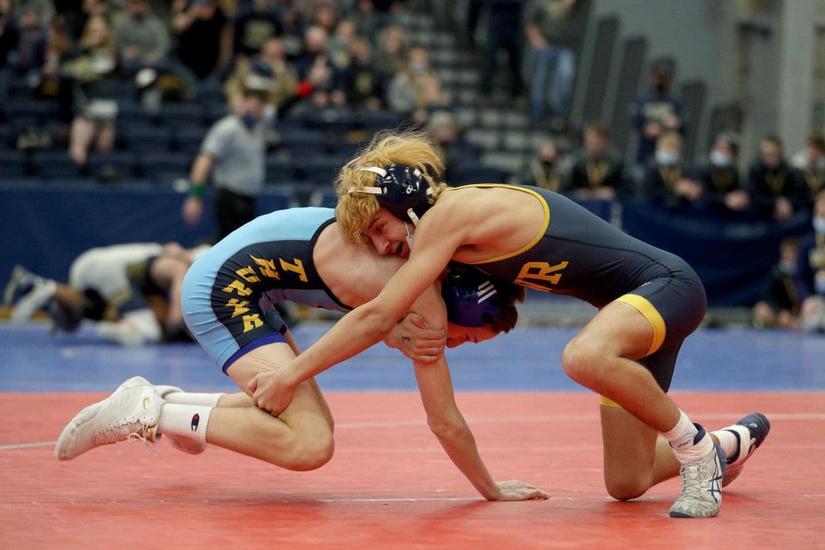 Central Valley Academys Maddox Walz, left, and Shoreham-Wading Rivers Ricky Sicoli wrestle during their 110 pound bout at the 2022 NYSPHSAA Wrestling Dual Meet Championships at SRC Arena in Syracuse, N.Y. on Jan. 29, 2022.