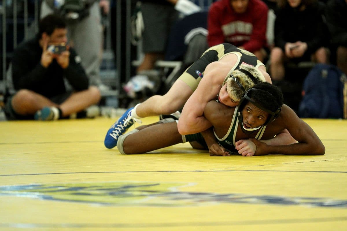 Wantagh's Joseph Clem wrestles Brentwood's Kyle Walker during their 118 pound bout at the 2022 NYSPHSAA Wrestling Dual Meet Championships at SRC Arena in Syracuse, N.Y. on Jan. 29, 2022.