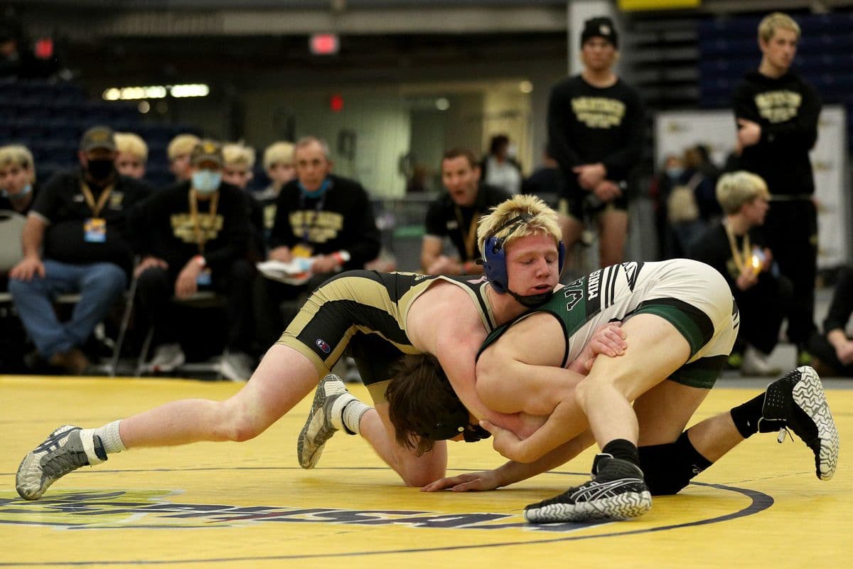 Wantagh's Jesse Vanorden, left, looks to score a takedown against Minisink Valley's Luke Greiner during their 145 pound bout at the 2022 NYSPHSAA Wrestling Dual Meet Championships at SRC Arena in Syracuse, N.Y. on Jan. 29, 2022.