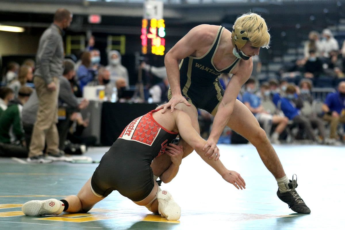 Lancasters Myles Gronowski, left, wrestles Wantaghs Thomas Bonasera during their 132 pound bout at the 2022 NYSPHSAA Wrestling Dual Meet Championships at SRC Arena in Syracuse, N.Y. on Jan. 29, 2022.