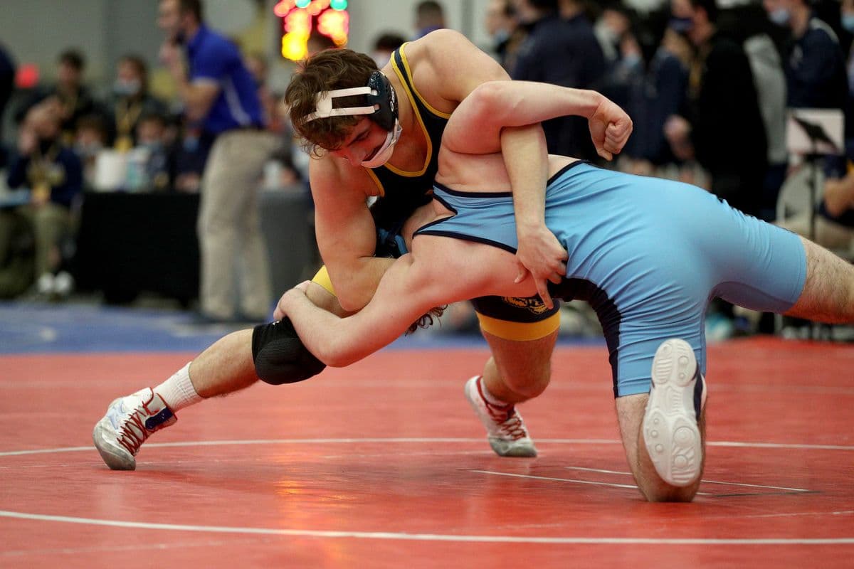 Shoreham-Wading Rivers Anthony Giordano, left, looks to turn Central Valley Academys Nikolai Penree during their 172 pound bout at the 2022 NYSPHSAA Wrestling Dual Meet Championships at SRC Arena in Syracuse, N.Y. on Jan. 29, 2022.