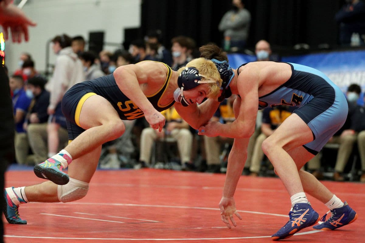 Shoreham-Wading Rivers Craig Jablonski, left, wrestles Central Valley Academys Kace Cook during their 145 pound bout at the 2022 NYSPHSAA Wrestling Dual Meet Championships at SRC Arena in Syracuse, N.Y. on Jan. 29, 2022.