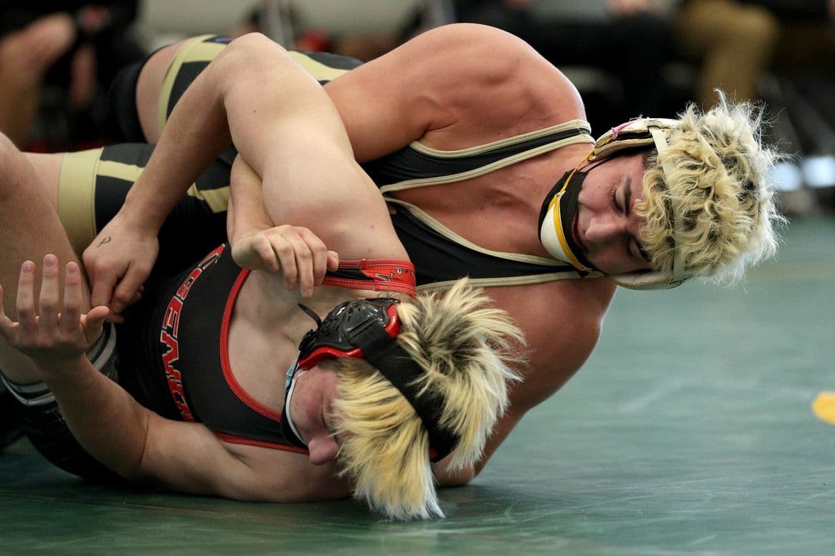 Wantaghs Ethan Merone, top, looks to turn Lancasters Evan Stencel wrestle during their 189 pound bout at the 2022 NYSPHSAA Wrestling Dual Meet Championships at SRC Arena in Syracuse, N.Y. on Jan. 29, 2022.