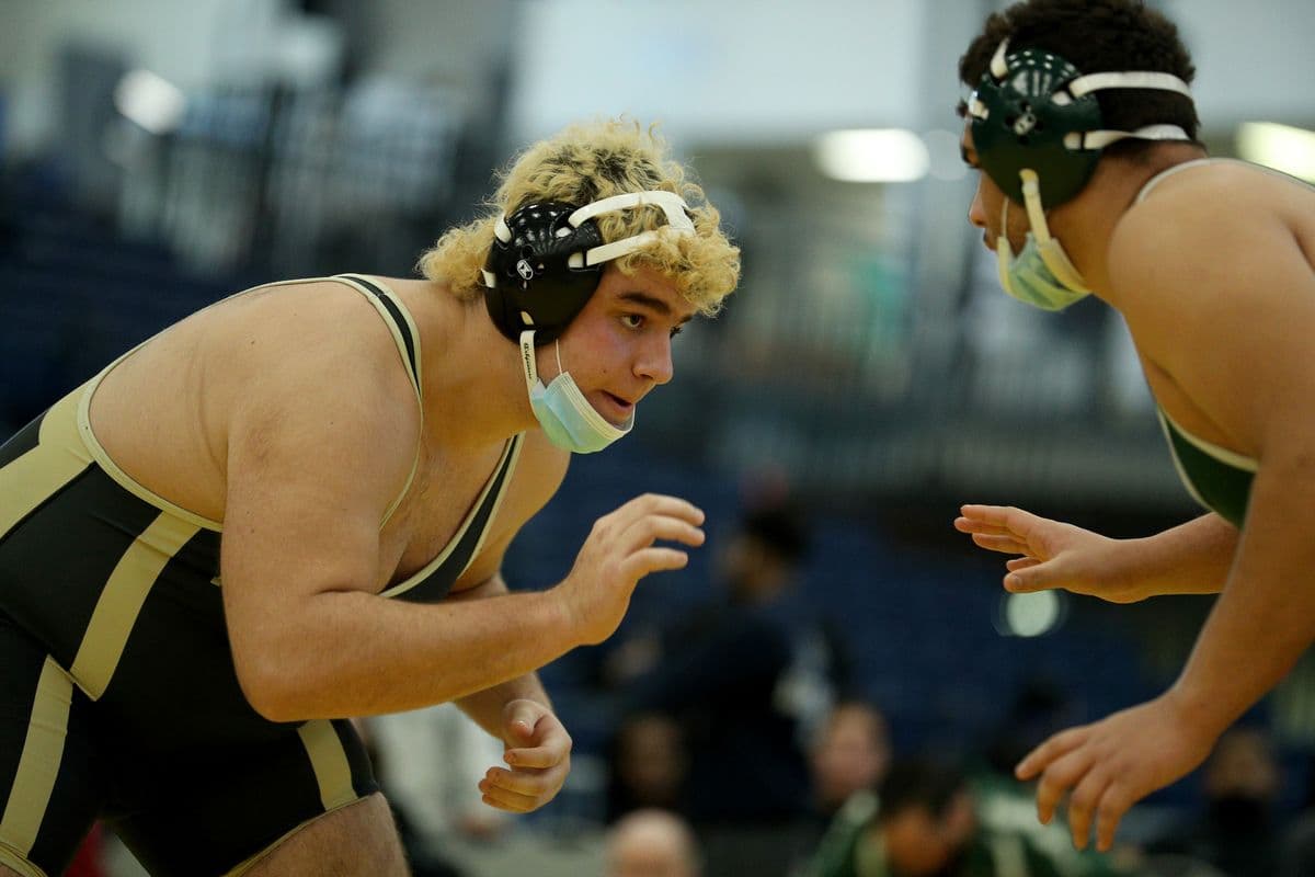 Wantagh's Nick Aldino, left, wrestles Brentwood's Elmer Cruz during their 285 pound bout at the 2022 NYSPHSAA Wrestling Dual Meet Championships at SRC Arena in Syracuse, N.Y. on Jan. 29, 2022.