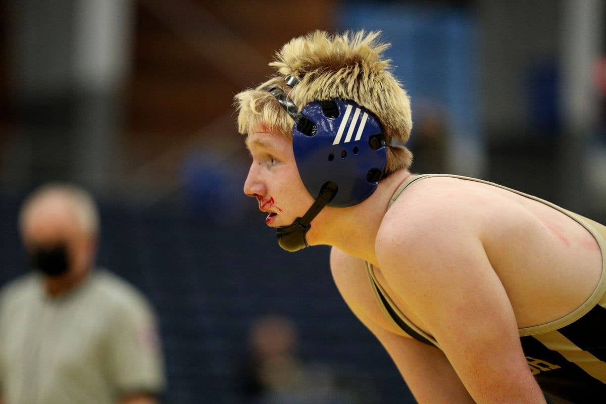 Wantagh's Jesse Vanorden looks on during a blood timeout against Minisink Valley's Luke Greiner during their 145 pound bout at the 2022 NYSPHSAA Wrestling Dual Meet Championships at SRC Arena in Syracuse, N.Y. on Jan. 29, 2022.
