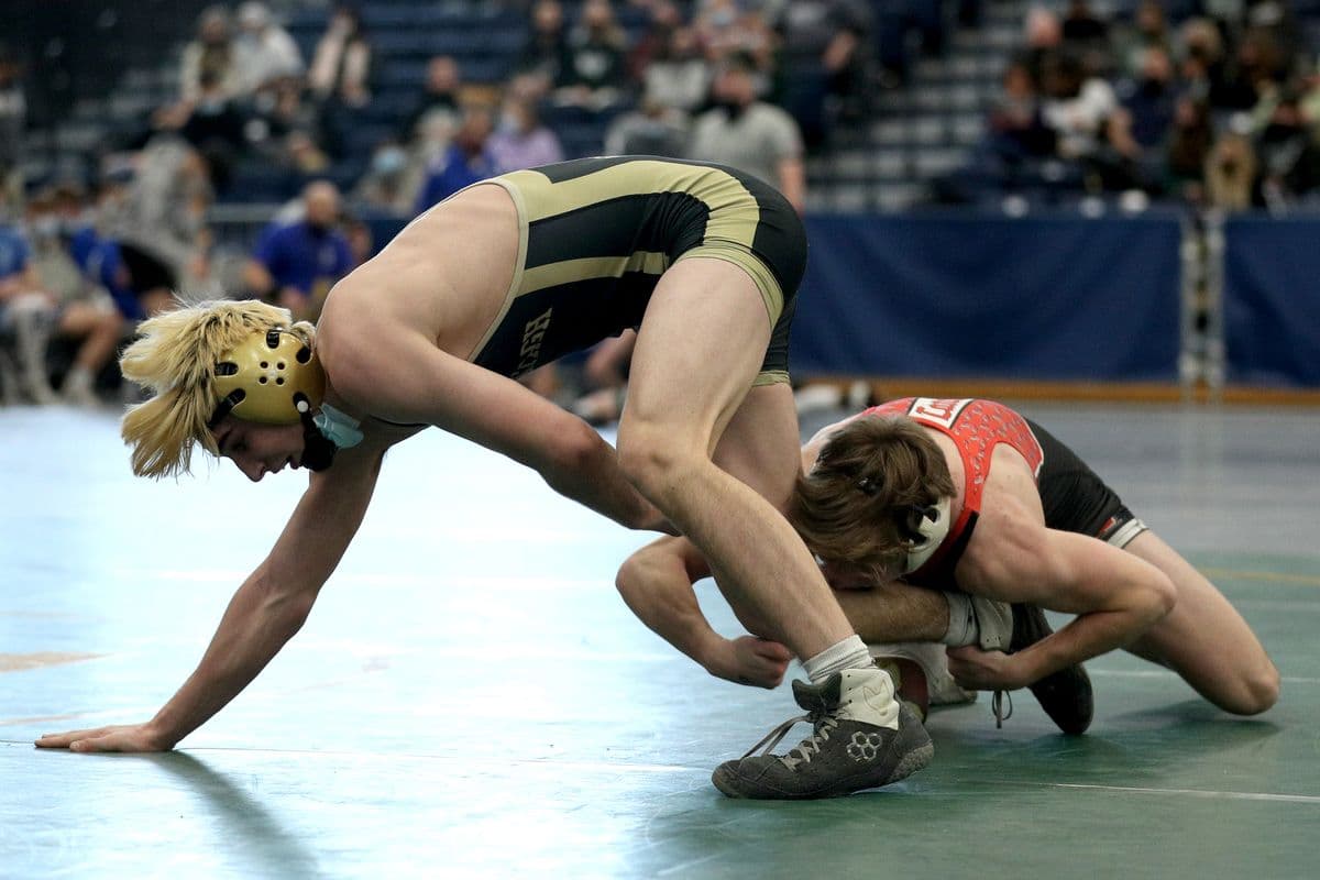 Wantaghs Thomas Bonasera, left, wrestles Lancasters Myles Gronowski during their 132 pound bout at the 2022 NYSPHSAA Wrestling Dual Meet Championships at SRC Arena in Syracuse, N.Y. on Jan. 29, 2022.