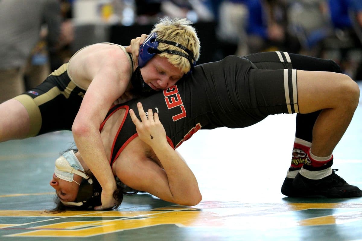 Wantaghs Jesse Vanorden looks to pin Lancasters Joseph Frieberg during their 145 pound bout at the 2022 NYSPHSAA Wrestling Dual Meet Championships at SRC Arena in Syracuse, N.Y. on Jan. 29, 2022.