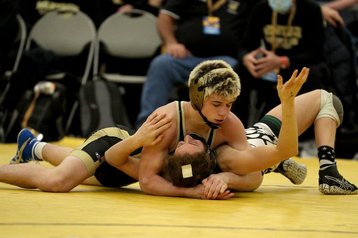 Wantagh's Joseph Clem, top, looks for back points as Minisink Valley's Sofia Macaluso fights off her back during their 118 pound bout at the 2022 NYSPHSAA Wrestling Dual Meet Championships at SRC Arena in Syracuse, N.Y. on Jan. 29, 2022.