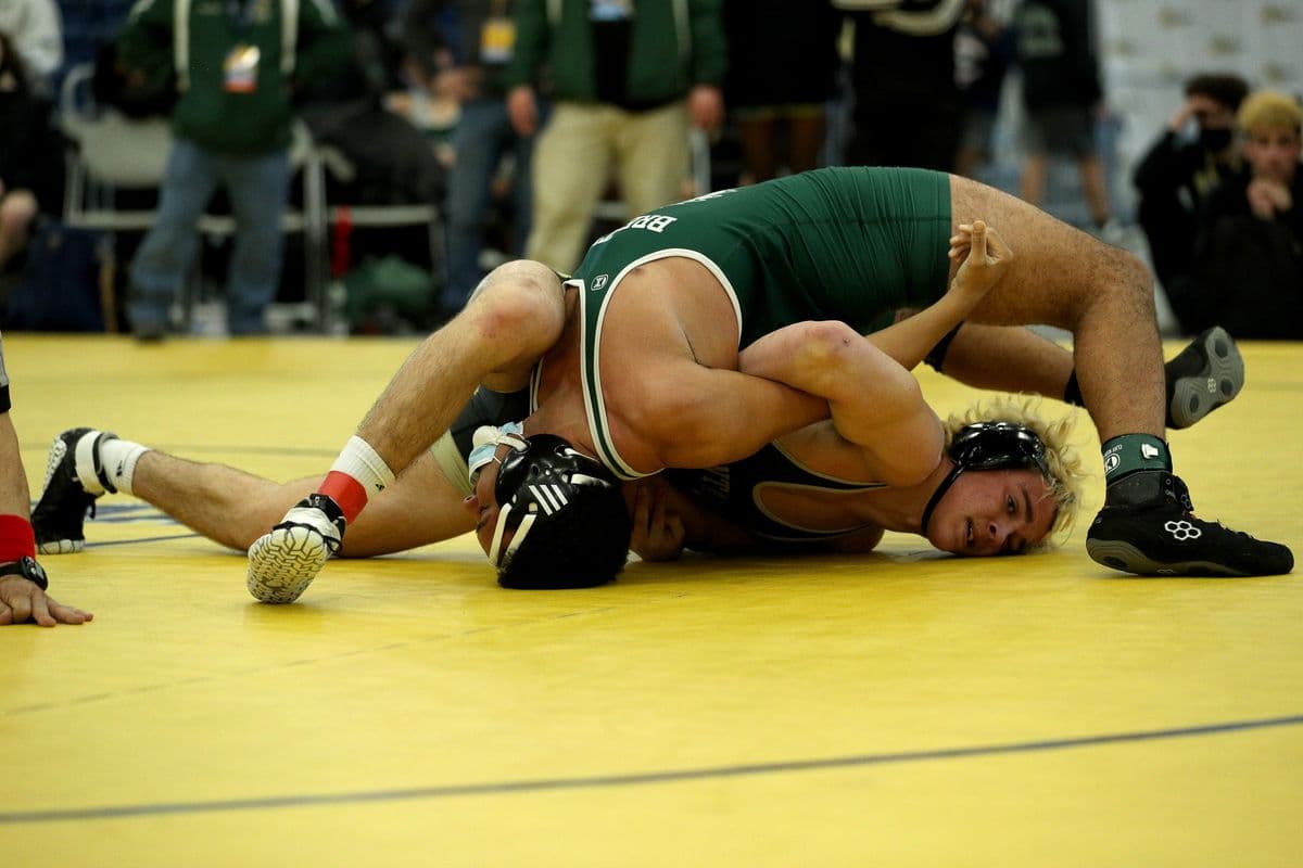 Wantagh's Noah Corwin, bottom, looks to pin Brentwood's Julian Perez during their 189 pound bout at the 2022 NYSPHSAA Wrestling Dual Meet Championships at SRC Arena in Syracuse, N.Y. on Jan. 29, 2022.
