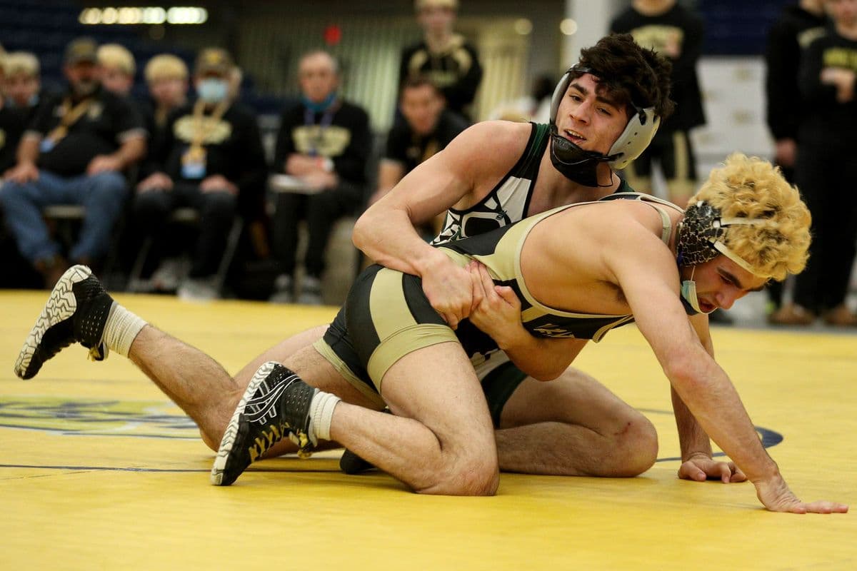 Minisink Valley's Eric Tigue wrestles Wantagh's Ben Rogers, bottom, during their 152 pound bout at the 2022 NYSPHSAA Wrestling Dual Meet Championships at SRC Arena in Syracuse, N.Y. on Jan. 29, 2022.