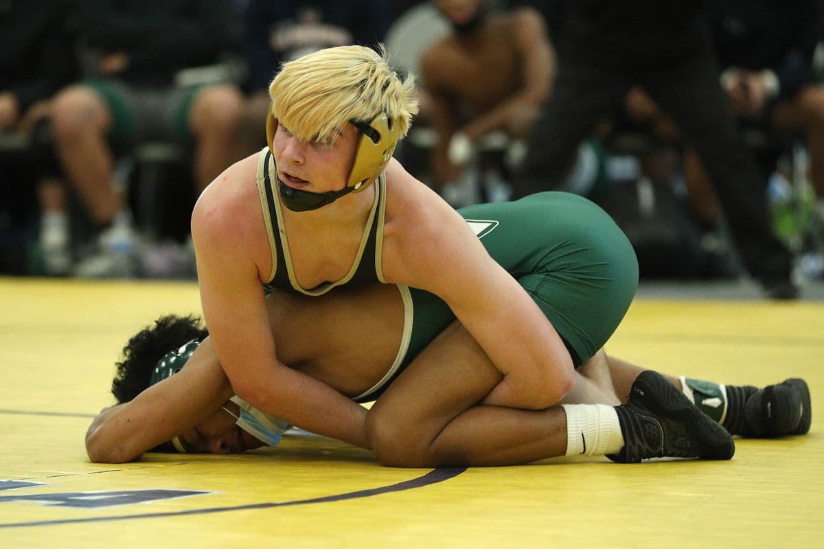 Wantaghs Thomas Bonasera, top, wrestles Brentwoods Juan Hernandez during their 138 pound bout at the 2022 NYSPHSAA Wrestling Dual Meet Championships at SRC Arena in Syracuse, N.Y. on Jan. 29, 2022.