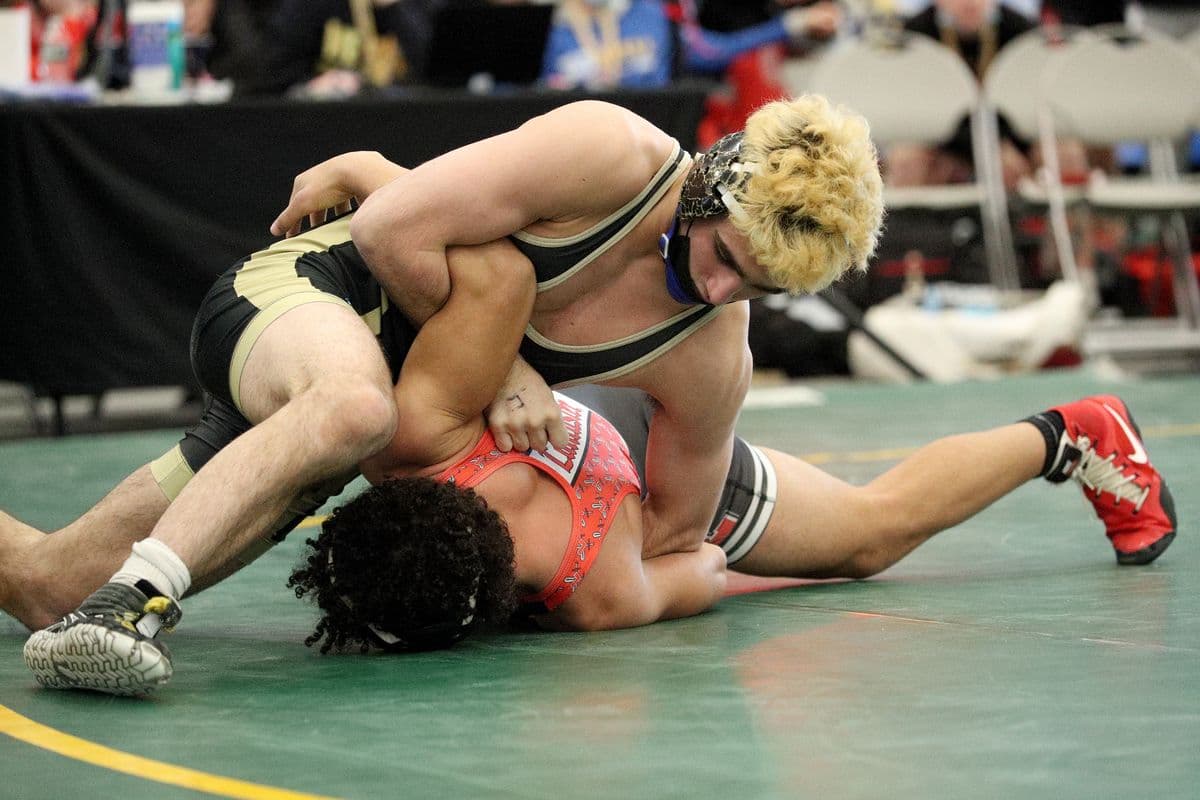 Wantaghs Ben Rogers, top, looks to turn Lancasters Jayden Colon during their 152 pound bout at the 2022 NYSPHSAA Wrestling Dual Meet Championships at SRC Arena in Syracuse, N.Y. on Jan. 29, 2022.