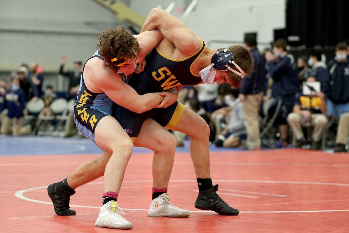 Central Valley Academys Santino Curley, left, wrestles Shoreham-Wading Rivers Will Miller during their 138 pound bout at the 2022 NYSPHSAA Wrestling Dual Meet Championships at SRC Arena in Syracuse, N.Y. on Jan. 29, 2022.
