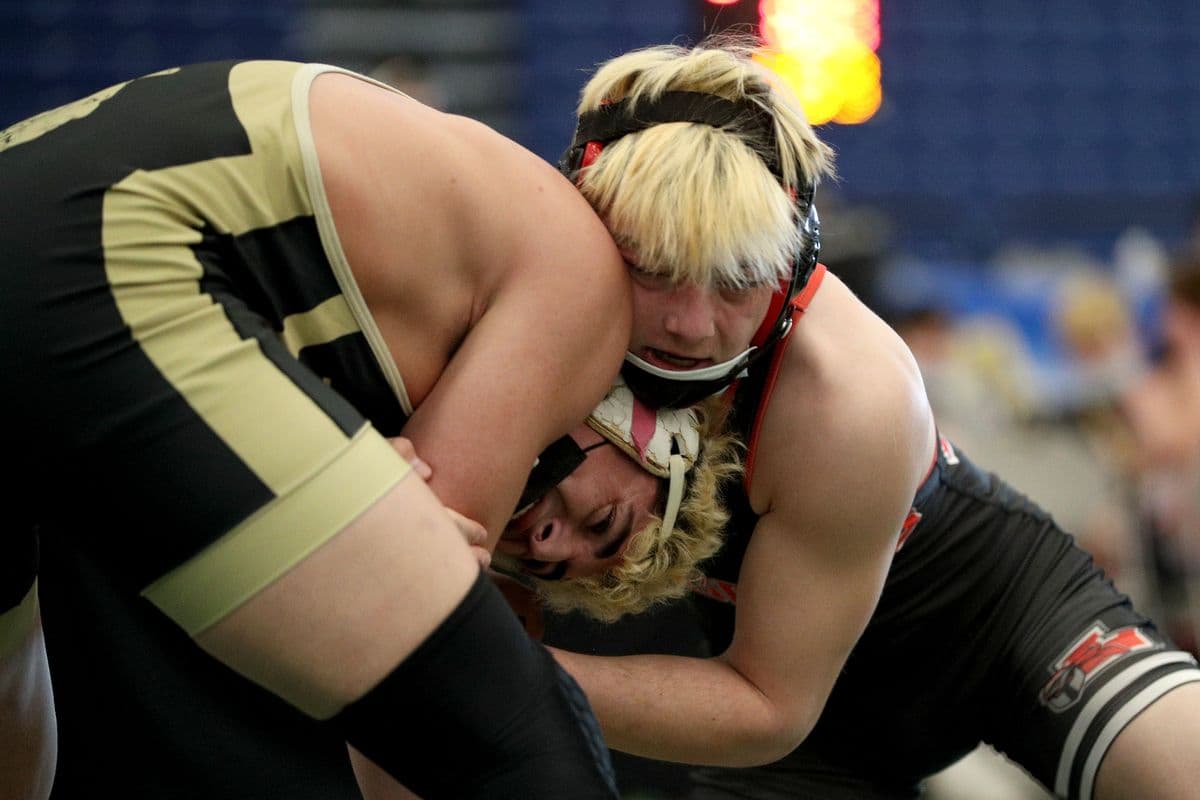 Wantaghs Ethan Merone, left, and Lancasters Evan Stencel wrestle during their 189 pound bout at the 2022 NYSPHSAA Wrestling Dual Meet Championships at SRC Arena in Syracuse, N.Y. on Jan. 29, 2022.