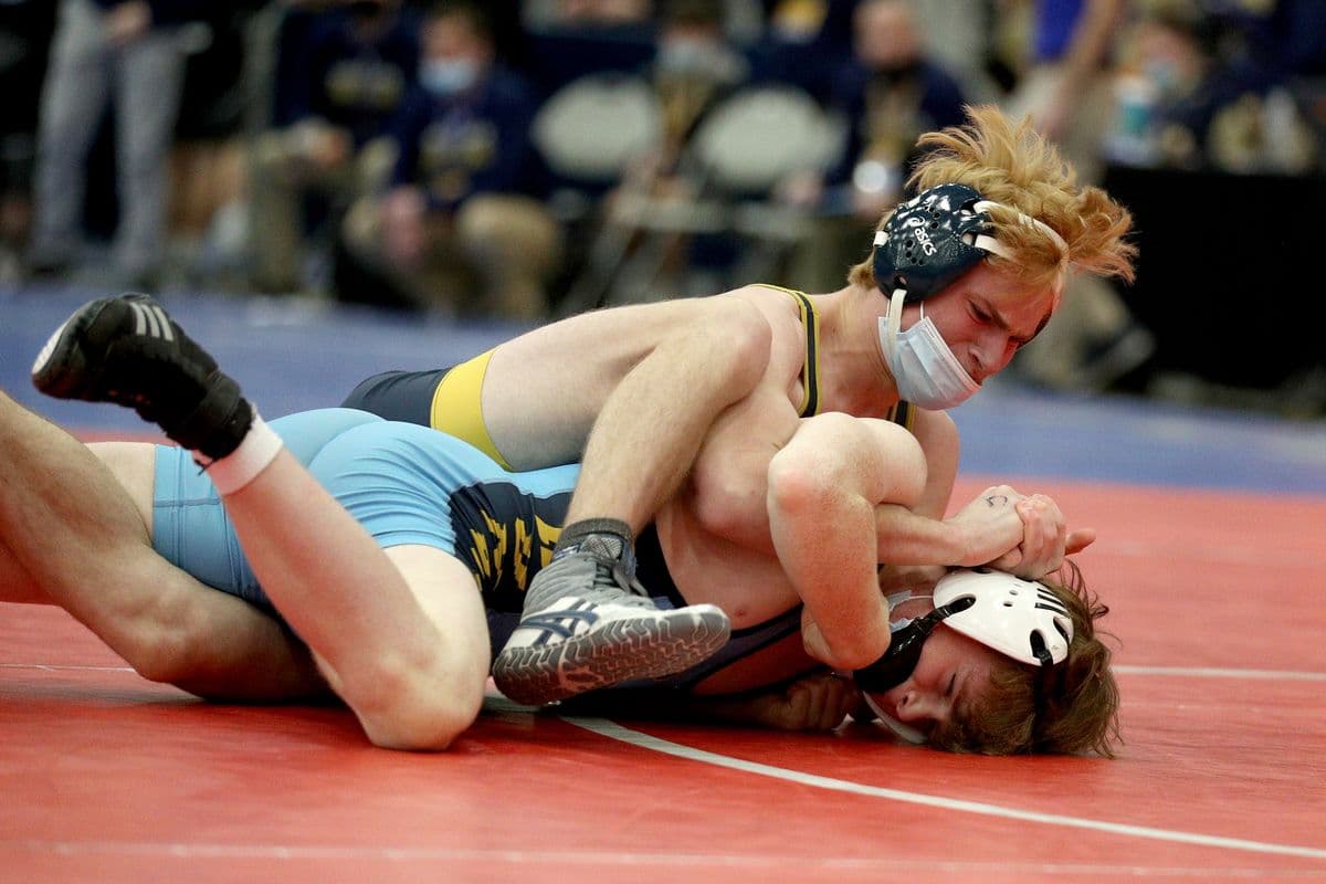 Shoreham-Wading Rivers Tristan Petretti, top, wrestles Central Valley Academys Aden Mead during their 132 pound bout at the 2022 NYSPHSAA Wrestling Dual Meet Championships at SRC Arena in Syracuse, N.Y. on Jan. 29, 2022.