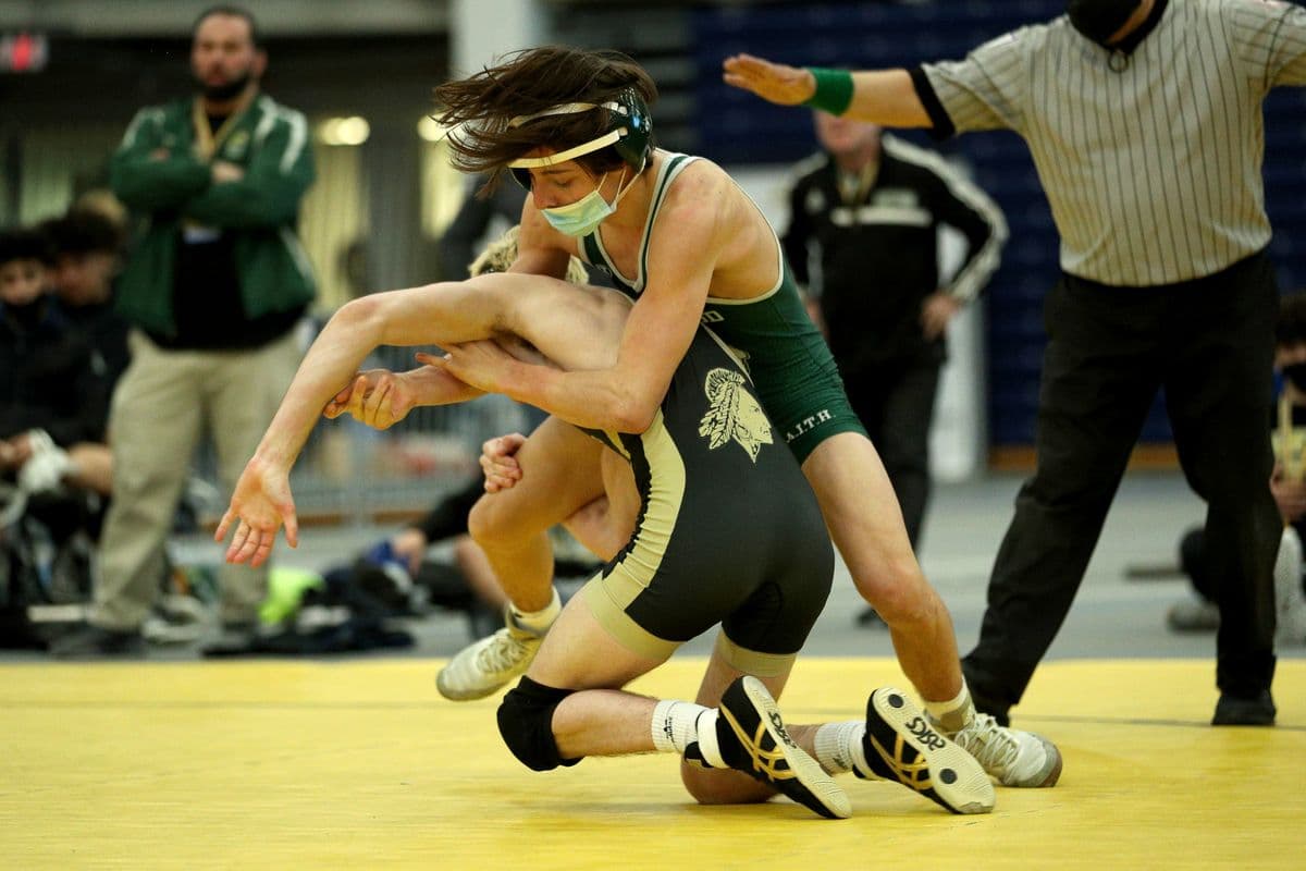 Brentwood's Kendricks Pellicci, top, wrestles Wantagh's Ryan Arbeit during their 126 pound bout at the 2022 NYSPHSAA Wrestling Dual Meet Championships at SRC Arena in Syracuse, N.Y. on Jan. 29, 2022.