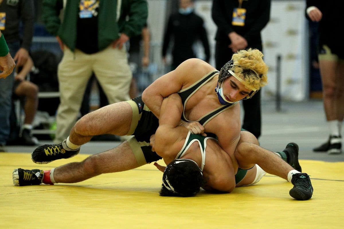 Wantaghs Ben Rogers looks to turn Brentwoods Michael Hernandez during their 160 pound bout at the 2022 NYSPHSAA Wrestling Dual Meet Championships at SRC Arena in Syracuse, N.Y. on Jan. 29, 2022.