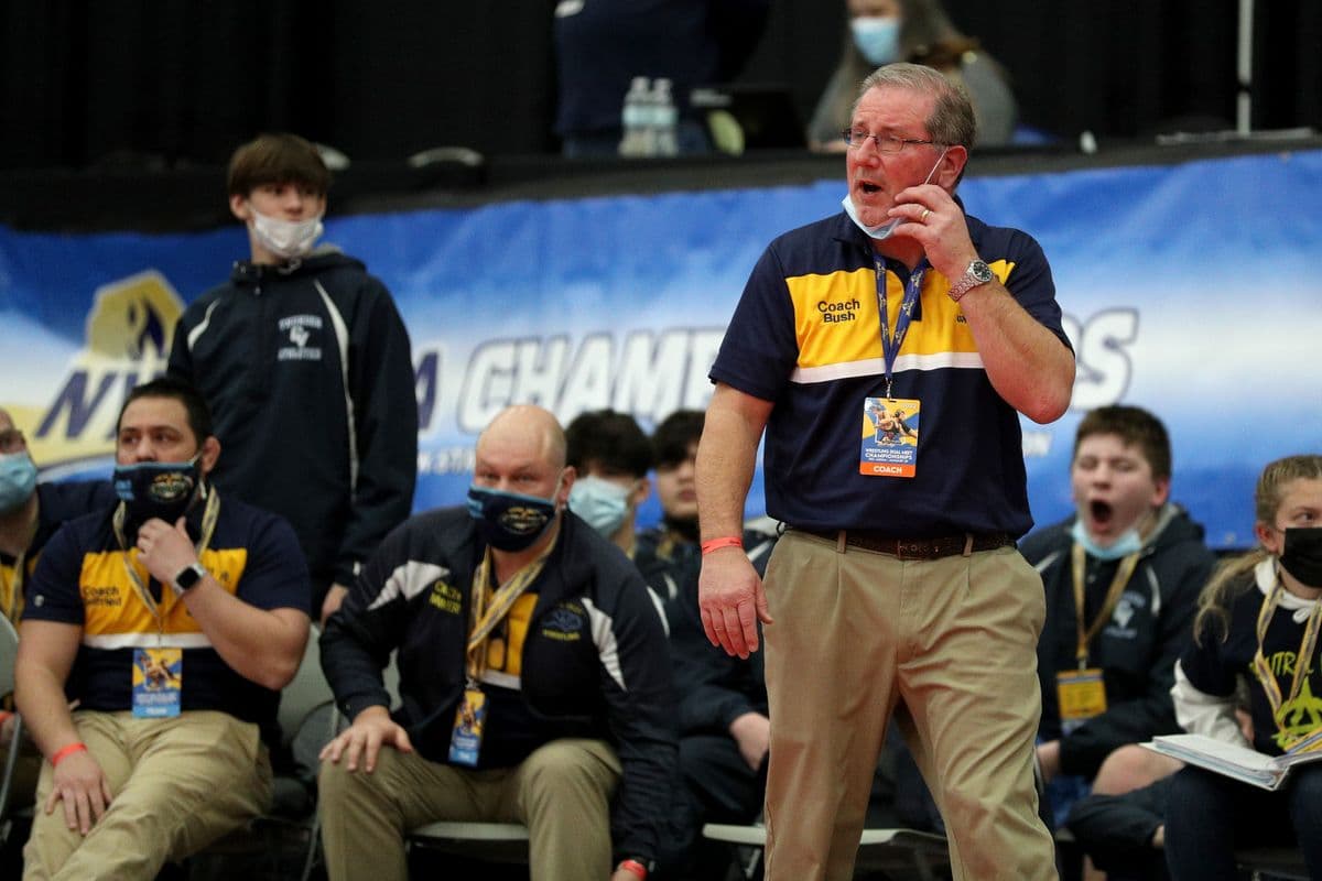 Central Valley Academy Head Coach Bob Bush reacts during a match between CVAs Kace Cook and Shoreham-Wading River's Craig Jablonski at the 2022 NYSPHSAA Wrestling Dual Meet Championships at SRC Arena in Syracuse, N.Y. on Jan. 29, 2022.
