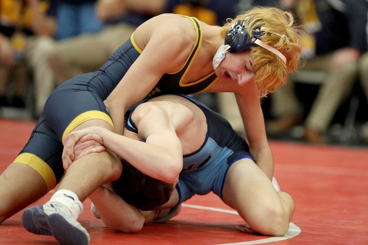 Shoreham-Wading Rivers Ricky Sicoli, top, wrestles Central Valley Academys Maddox Walz during their 110 pound bout at the 2022 NYSPHSAA Wrestling Dual Meet Championships at SRC Arena in Syracuse, N.Y. on Jan. 29, 2022.