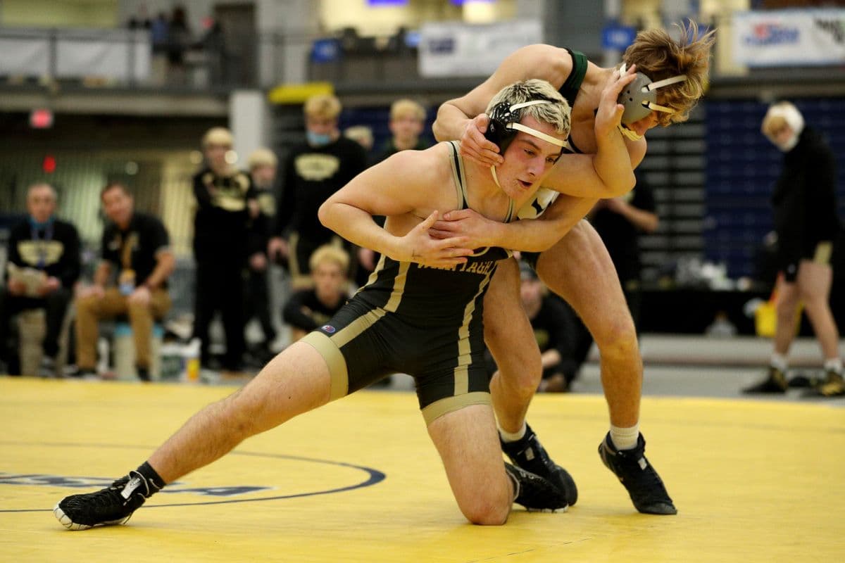 Wantagh's Daniel Pettinato looks to escape Minisink Valley's George Racz during their 160 pound bout at the 2022 NYSPHSAA Wrestling Dual Meet Championships at SRC Arena in Syracuse, N.Y. on Jan. 29, 2022.