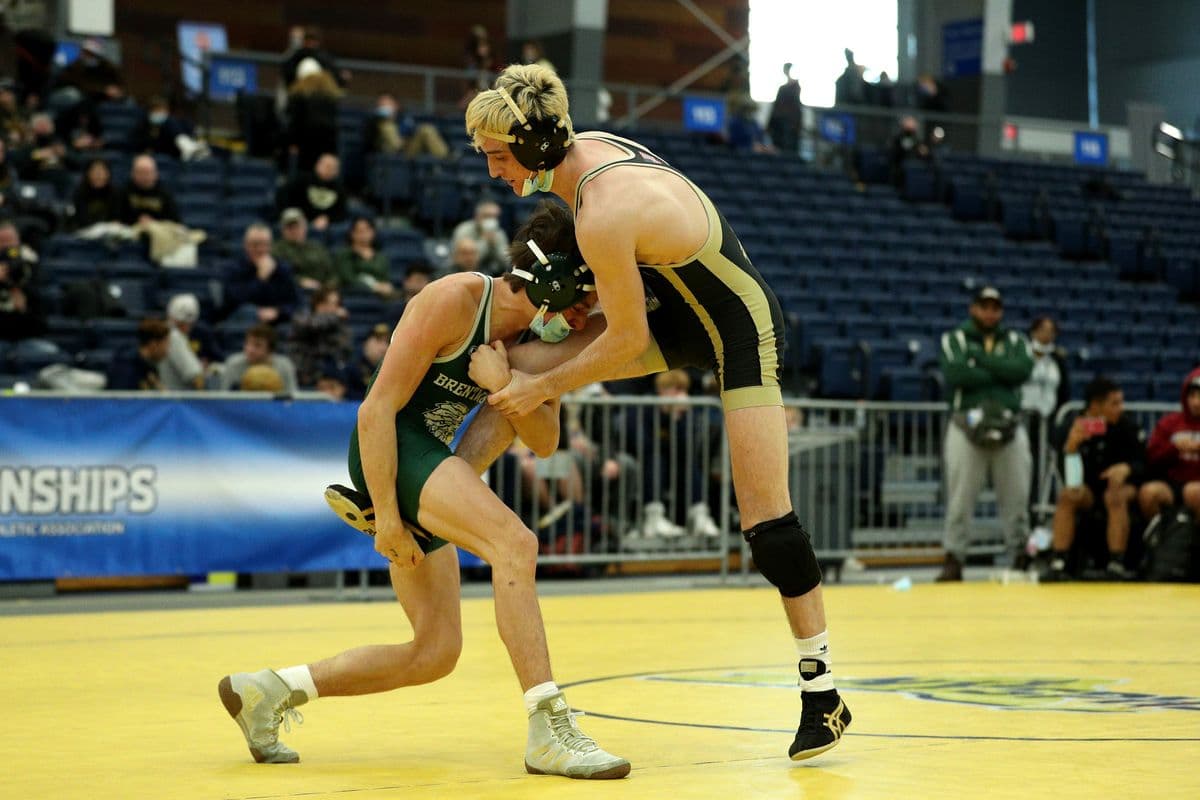 Brentwood's Kendricks Pellicci looks to score a takedown against Wantagh's Ryan Arbeit during their 126 pound bout at the 2022 NYSPHSAA Wrestling Dual Meet Championships at SRC Arena in Syracuse, N.Y. on Jan. 29, 2022.