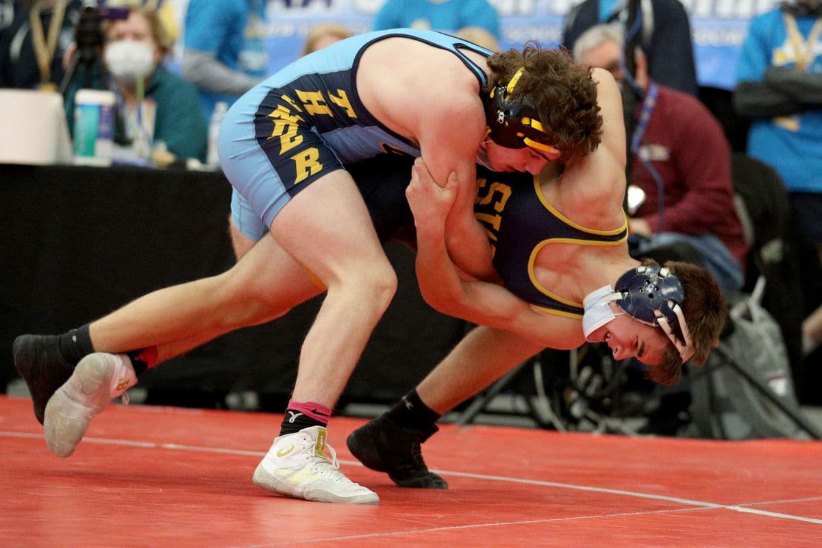 Central Valley Academys Santino Curley, top, wrestles Shoreham-Wading Rivers Will Miller during their 138 pound bout at the 2022 NYSPHSAA Wrestling Dual Meet Championships at SRC Arena in Syracuse, N.Y. on Jan. 29, 2022.