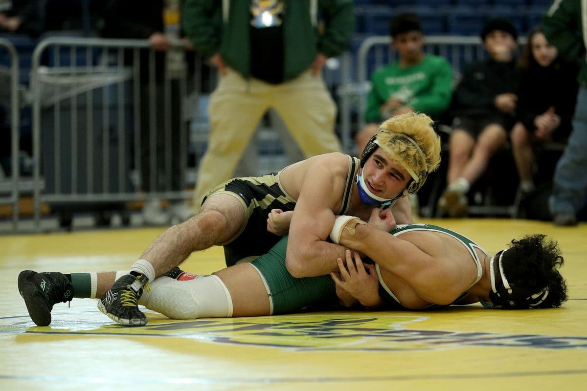 Wantaghs Ben Rogers looks to turn Brentwoods Michael Hernandez during their 160 pound bout at the 2022 NYSPHSAA Wrestling Dual Meet Championships at SRC Arena in Syracuse, N.Y. on Jan. 29, 2022.