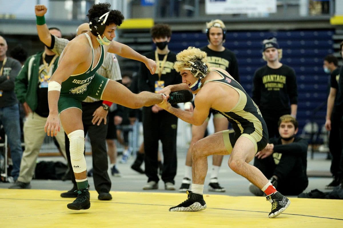 Brentwoods Michael Hernandez attempts to escape Wantaghs Ben Rogers during their 160 pound bout at the 2022 NYSPHSAA Wrestling Dual Meet Championships at SRC Arena in Syracuse, N.Y. on Jan. 29, 2022.