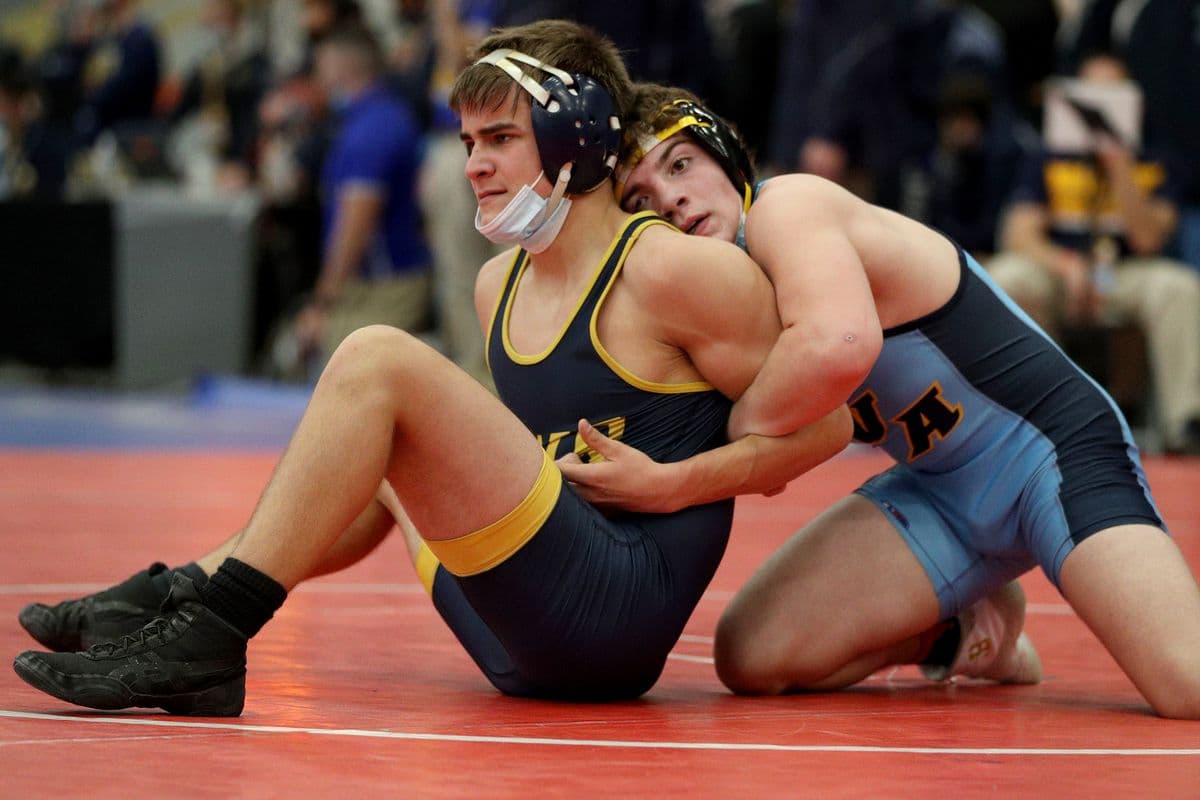 Shoreham-Wading Rivers Will Miller, left, wrestles Central Valley Academys Santino Curley during their 138 pound bout at the 2022 NYSPHSAA Wrestling Dual Meet Championships at SRC Arena in Syracuse, N.Y. on Jan. 29, 2022.