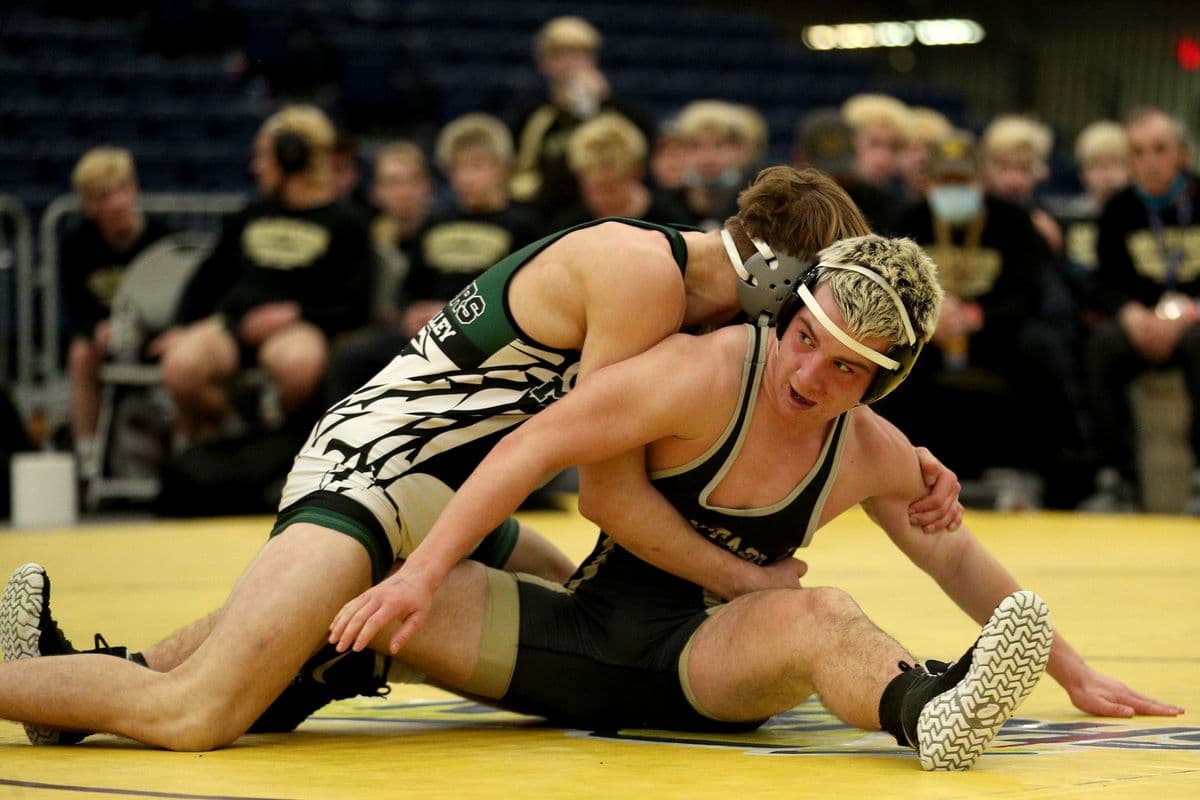 Wantagh's Daniel Pettinato, bottom, looks to escape Minisink Valley's George Racz during their 160 pound bout at the 2022 NYSPHSAA Wrestling Dual Meet Championships at SRC Arena in Syracuse, N.Y. on Jan. 29, 2022.