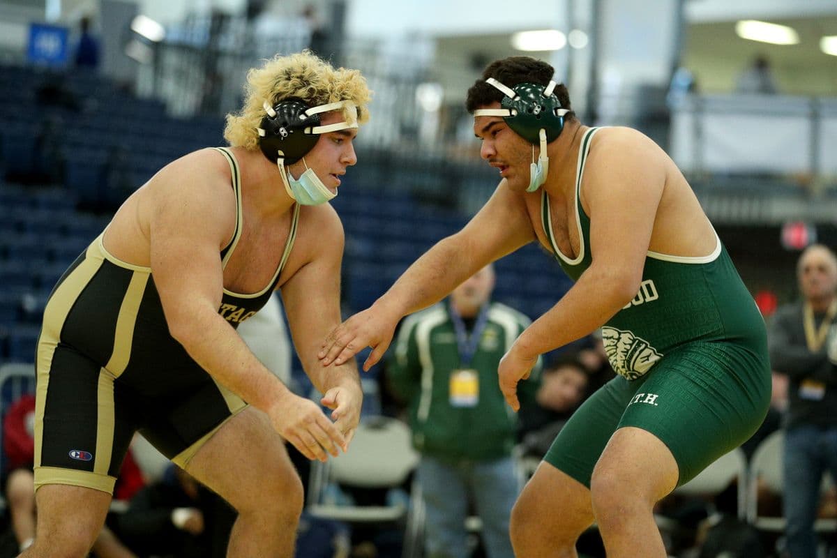 Wantagh's Nick Aldino, left, wrestles Brentwood's Elmer Cruz during their 285 pound bout at the 2022 NYSPHSAA Wrestling Dual Meet Championships at SRC Arena in Syracuse, N.Y. on Jan. 29, 2022.