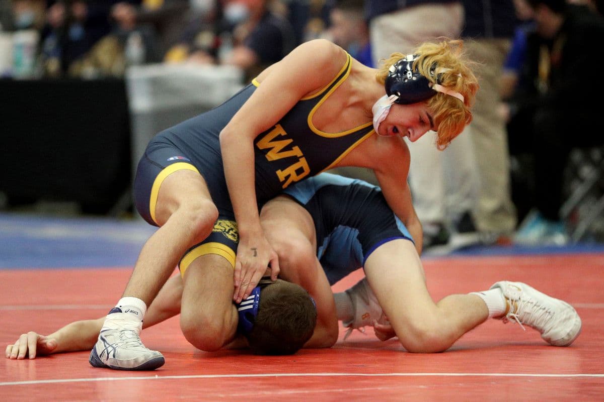 Shoreham-Wading Rivers Ricky Sicoli, top, wrestles Central Valley Academys Maddox Walz during their 110 pound bout at the 2022 NYSPHSAA Wrestling Dual Meet Championships at SRC Arena in Syracuse, N.Y. on Jan. 29, 2022.