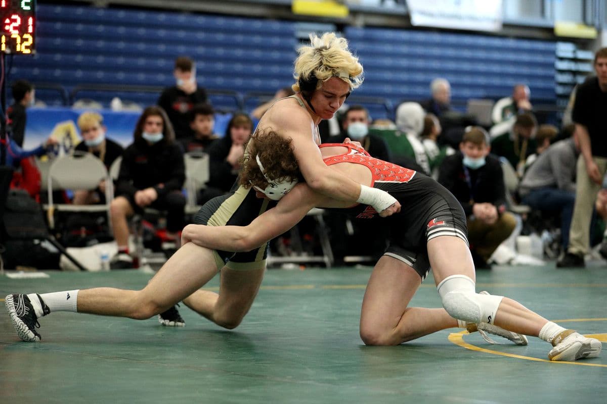 Wantaghs Noah Corwin, left, and Lancasters Michael Schaefer wrestle during their 172 pound bout at the 2022 NYSPHSAA Wrestling Dual Meet Championships at SRC Arena in Syracuse, N.Y. on Jan. 29, 2022.
