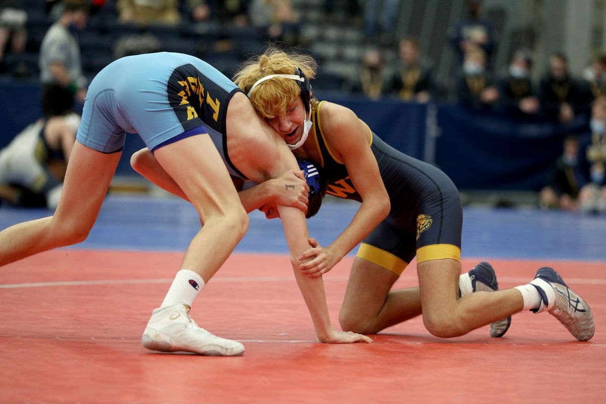 Central Valley Academys Maddox Walz, left, and Shoreham-Wading Rivers Ricky Sicoli wrestle during their 110 pound bout at the 2022 NYSPHSAA Wrestling Dual Meet Championships at SRC Arena in Syracuse, N.Y. on Jan. 29, 2022.