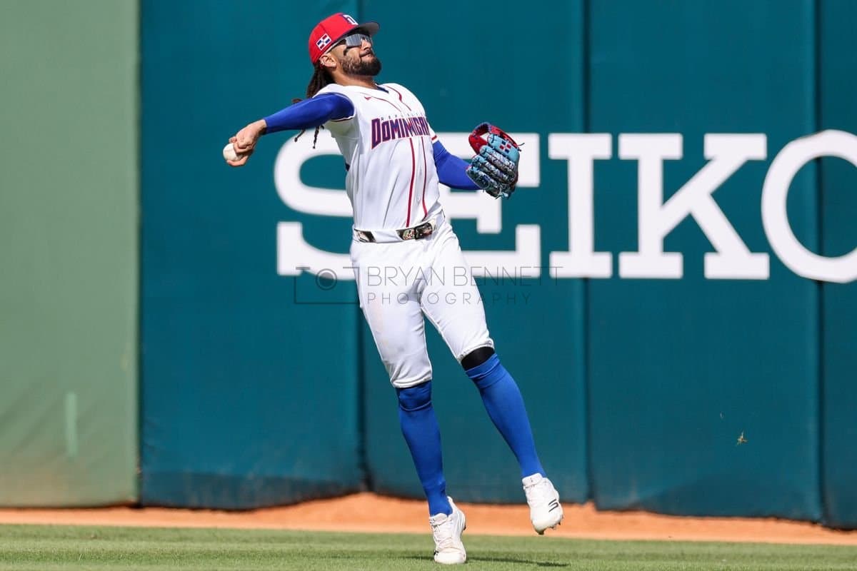 SANTO DOMINGO, DOMINICAN REPUBLIC - MARCH 04: Fernando Tatis Jr. #23 of the Dominican Republic throws a ball during an exhibition game against the Detroit Tigers at Estadio Quisqueya on March 04, 2026 in Santo Domingo, Dominican Republic. (Photo by Bryan Bennett/Getty Images)