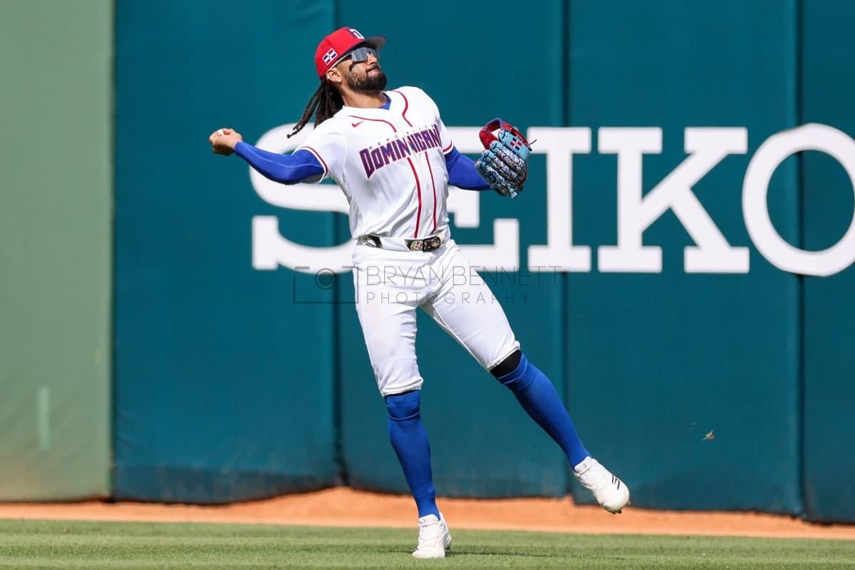 SANTO DOMINGO, DOMINICAN REPUBLIC - MARCH 04: Fernando Tatis Jr. #23 of the Dominican Republic throws a bal during an exhibition game against the Detroit Tigers at Estadio Quisqueya on March 04, 2026 in Santo Domingo, Dominican Republic. (Photo by Bryan Bennett/Getty Images)