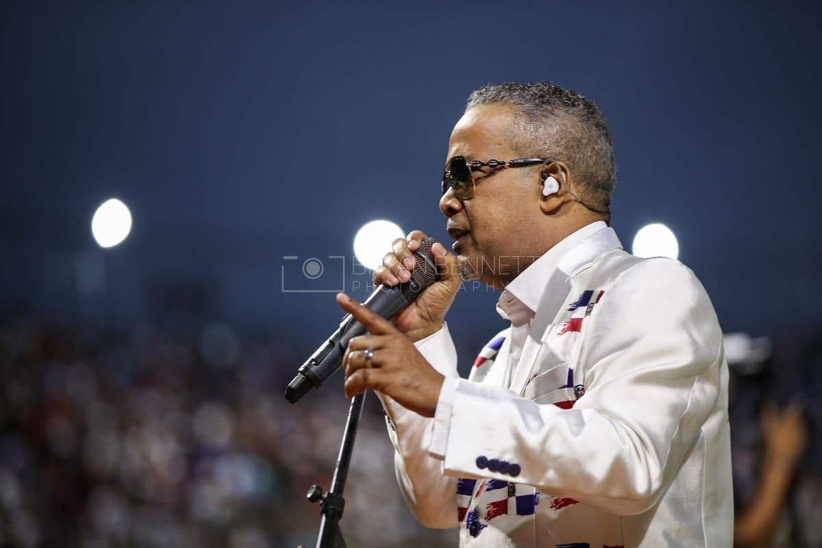 SANTO DOMINGO, DOMINICAN REPUBLIC - MARCH 03: Hector Acosta "El Torito" sings the Dominican National Anthem prior to an exhibition game between the Detroit Tigers and the Dominican Republic at Estadio Quisqueya on March 03, 2026 in Santo Domingo, Dominican Republic. (Photo by Bryan Bennett/Getty Images)