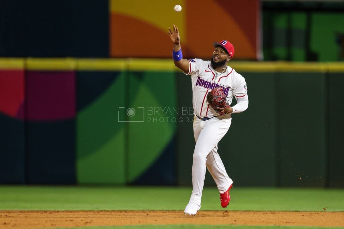 SANTO DOMINGO, DOMINICAN REPUBLIC - MARCH 03: Vladimir Guerrero Jr. #27 of the Dominican Republic flips a ball during an exhibition game against the Detroit Tigers at Estadio Quisqueya on March 03, 2026 in Santo Domingo, Dominican Republic. (Photo by Bryan Bennett/Getty Images)