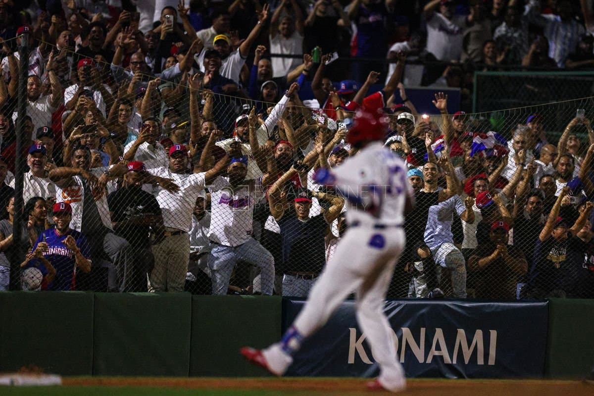 SANTO DOMINGO, DOMINICAN REPUBLIC - MARCH 03: Fans react after Junior Caminero #13 of the Dominican Republic hit a home run during the fourth inning of an exhibition game against the Detroit Tigers at Estadio Quisqueya on March 03, 2026 in Santo Domingo, Dominican Republic. (Photo by Bryan Bennett/Getty Images)