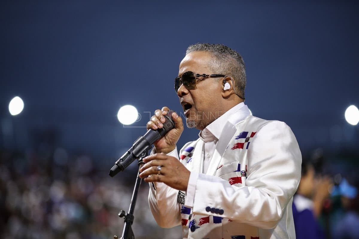 SANTO DOMINGO, DOMINICAN REPUBLIC - MARCH 03: Hector Acosta "El Torito" sings the Dominican National Anthem prior to an exhibition game between the Detroit Tigers and the Dominican Republic at Estadio Quisqueya on March 03, 2026 in Santo Domingo, Dominican Republic. (Photo by Bryan Bennett/Getty Images)