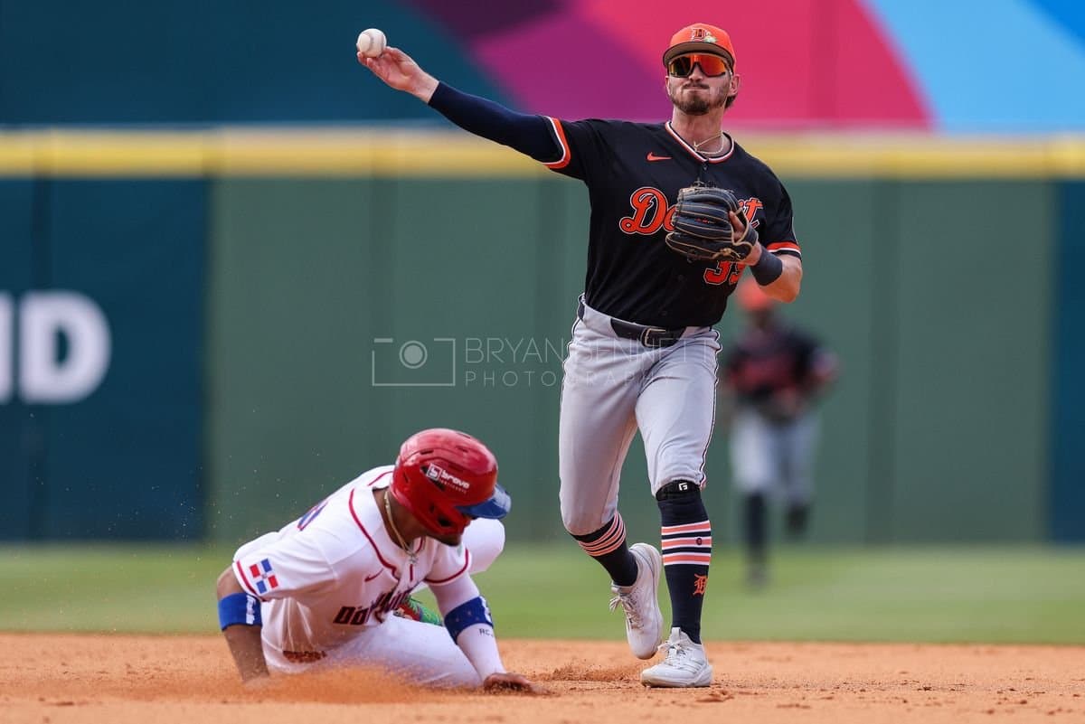 SANTO DOMINGO, DOMINICAN REPUBLIC - MARCH 04: Ricardo Cespedes #88 of Dominican Republic slides into second base as Zach McKinstry #39 of the Detroit Tigers throws the ball during an exhibition game at Estadio Quisqueya on March 04, 2026 in Santo Domingo, Dominican Republic. (Photo by Bryan M. Bennett/Getty Images)